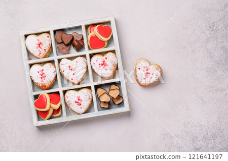 A charming selection of heart-shaped sweets neatly arranged in a box A charming selection of heart-shaped sweets neatly arranged in a box 121641197