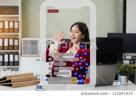 Happy business woman having fun social media doing live streaming using smartphone or laptop during free time. Happy business woman having fun social media doing live streaming using smartphone or laptop during free time. 121641814