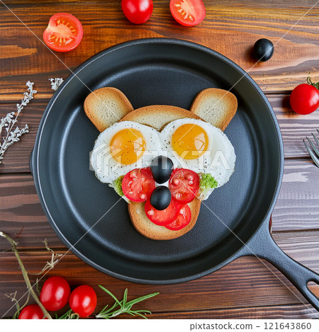 Whimsical Bear Face Meal Served in a Black Skillet 121643860