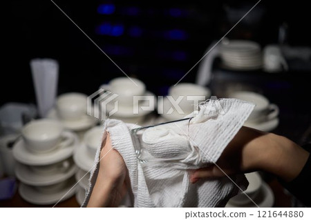 Cleaning glassware effectively in the fast paced environment of a bustling restaurant 121644880