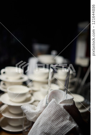 Cleaning glassware effectively in the fast paced environment of a bustling restaurant 121644886