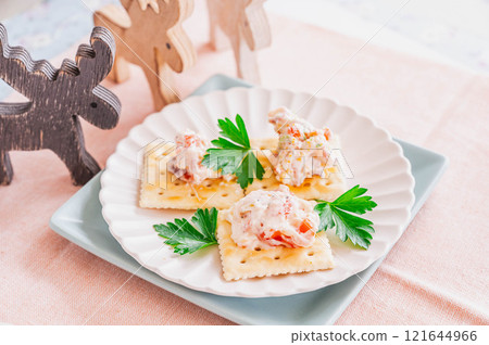 Salmon and surf clam salad canapes Salmon and surf clam salad canapes 121644966