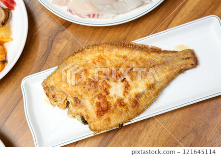 Korean seafood food. Grilled flounder fish 121645114
