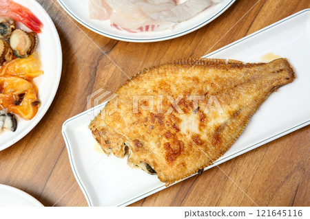 Korean seafood food. Grilled flounder fish 121645116