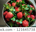 Strawberries in a metal bowl 121645738