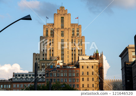 Montreal, Quebec, Canada - August 11 2021 : Aldred Building. A building on the historic Place d'Armes square in the Old Montreal. Montreal, Quebec, Canada - August 11 2021 : Aldred Building. A building on the historic Place d'Armes square in the Old Montreal. 121646520