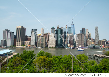Historic buildings on one of the iconic streets in New York City, Manhattan reportage photography, modern cityscape, famous skyscrapers, Manhattan, NYC, NY, USA Historic buildings on one of the iconic streets in New York City, Manhattan reportage photography, modern cityscape, famous skyscrapers, Manhattan, NYC, NY, USA 121647392