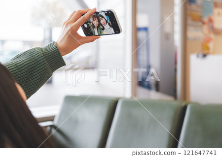 Image of girls excited before leaving on a trip Image of girls excited before leaving on a trip 121647741