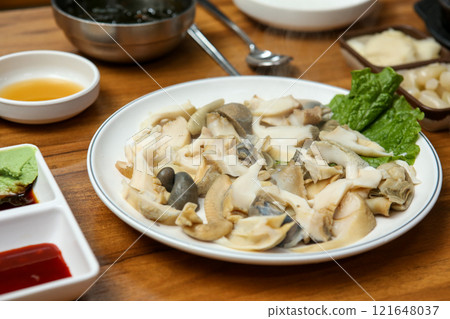 Korean seafood food. Boiled conch sashimi Korean seafood food. Boiled conch sashimi 121648037
