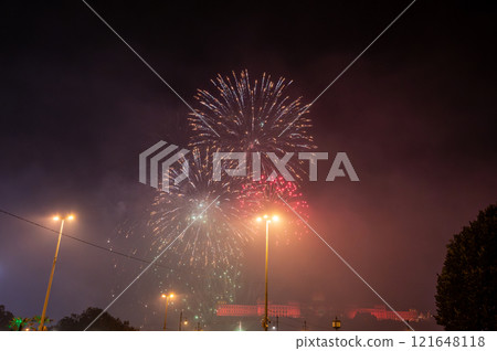 Budapest,Hungary. August 27,2022. To celebrate the Hungarian National Day, a massive fireworks display is performed in Budapest over the Danube. In the background, Buda Castle. Budapest,Hungary. August 27,2022. To celebrate the Hungarian National Day, a massive fireworks display is performed in Budapest over the Danube. In the background, Buda Castle. 121648118