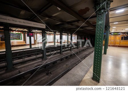 Budapest, Hungary. August 27, 2022. Shot inside the historic metro line 1. Bajza utca stop. Wood paneling and vintage ironwork. 121648121