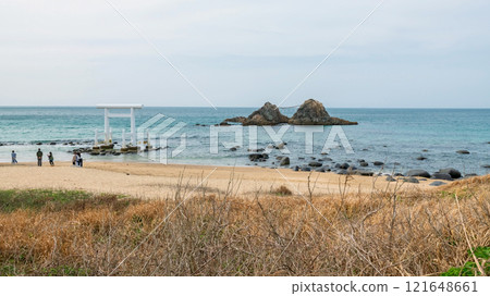 People at Sakurai Futamigaura couple stones and torii gate, Itoshima 121648661