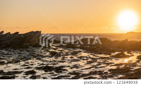 Coastal landscape illuminated by the setting sun Coastal landscape illuminated by the setting sun 121649038