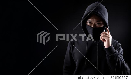 Criminal making a phone call. 121650537