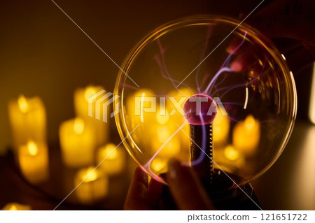 Experience the enchanting Mystical Energy created with Candlelight and illuminated by a Plasma Ball 121651722