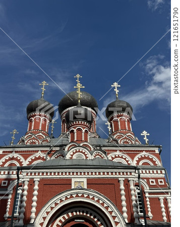 Ornate Russian Orthodox Church Domes Against Blue Sky Ornate Russian Orthodox Church Domes Against Blue Sky 121651790