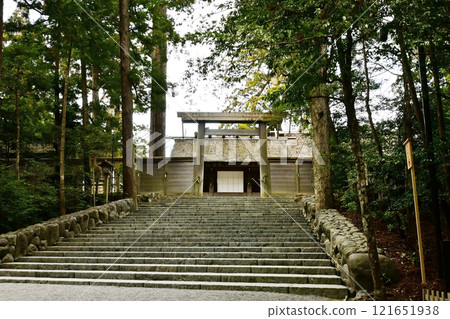 The Inner Shrine without people reflected in it. A view of the main shrine of the Inner Shrine. Ise Shrine. The stairs leading to the main shrine. 121651938