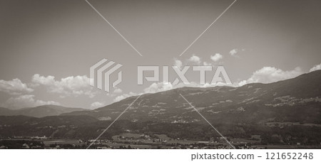 Wonderful wooded mountain alpine panorama with village and huts Austria. Wonderful wooded mountain alpine panorama with village and huts Austria. 121652248