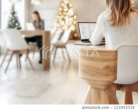A cozy modern home office setup with a holiday decorations 121653316