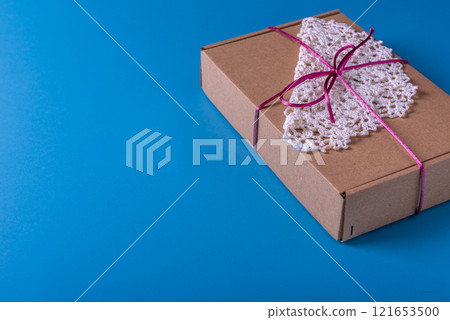 Present box, decoration of gift on table, top view with copy space Present box, decoration of gift on table, top view with copy space 121653500