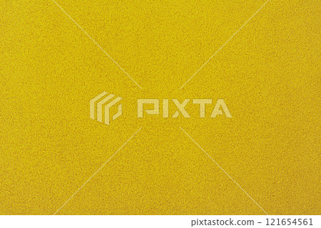 Yellow suede background. Texture of suede leather dyed in light yellow color. 121654561