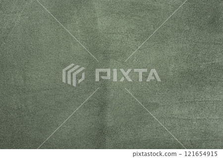 Green suede as a background. Suede leather macro photo khaki color. Green suede as a background. Suede leather macro photo khaki color. 121654915