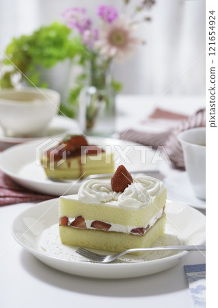 Shortcake placed on a table, vertical position 121654924