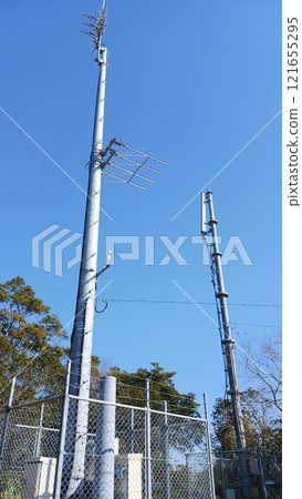 Lightning rod and base station on the mountain Lightning rod and base station on the mountain 121655295