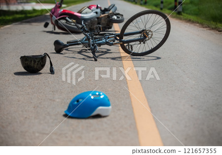 Accident Motocycle crash with bicycle on road 121657355