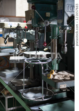 Drilling holes with a drill press Drilling holes with a drill press 121657683