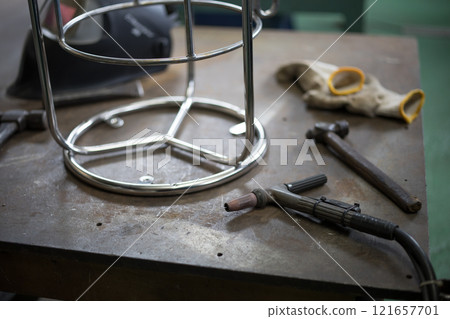 Parts being TIG welded 121657701