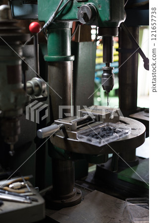 Drilling holes in resin 121657738