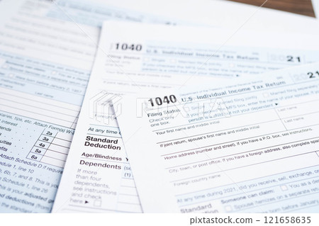 Tax form 1040 U.S. Individual Income Tax Return, business finance. Tax form 1040 U.S. Individual Income Tax Return, business finance. 121658635