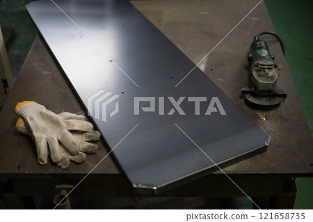 Finishing the corners with a grinder Finishing the corners with a grinder 121658735