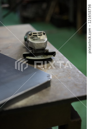 Finishing the corners with a grinder Finishing the corners with a grinder 121658736