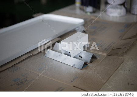 Painting the manufactured parts 121658746
