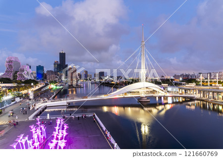 Night view of the Pier-2 Art Center and Dagang Bridge(Great Harbor Bridge) in the port of Kaohsiung, Taiwan. with the famous Kaohsiung Music Center and 85 Sky Tower. Night view of the Pier-2 Art Center and Dagang Bridge(Great Harbor Bridge) in the port of Kaohsiung, Taiwan. with the famous Kaohsiung Music Center and 85 Sky Tower. 121660769
