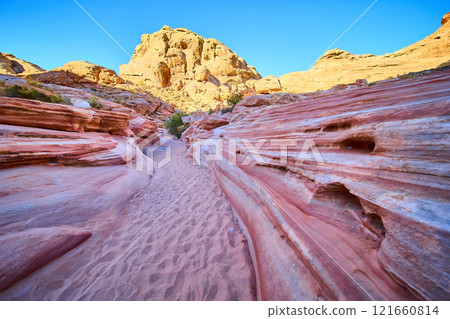 Sandstone Pathway Through Valley of Fire Erosion Low Angle View 121660814