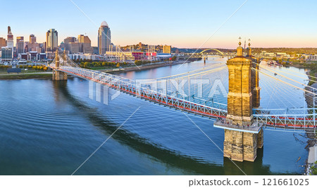 Aerial Panorama of John A. Roebling Bridge and Cincinnati Skyline at Golden Hour 121661025