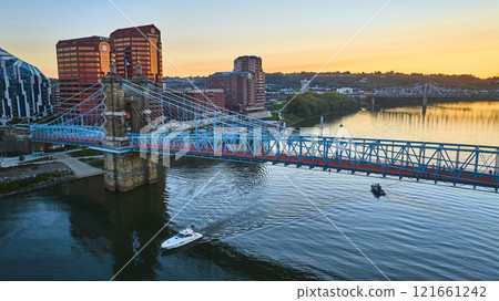 Aerial of John A Roebling Bridge at Sunset with City Skyline 121661242