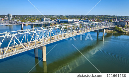 Aerial of Steel Bridge over Ohio River with Cincinnati Skyline 121661288
