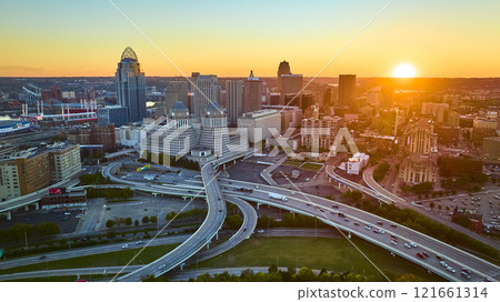 Aerial of Cincinnati Skyline at Sunset with Ohio River and Highways Aerial of Cincinnati Skyline at Sunset with Ohio River and Highways 121661314