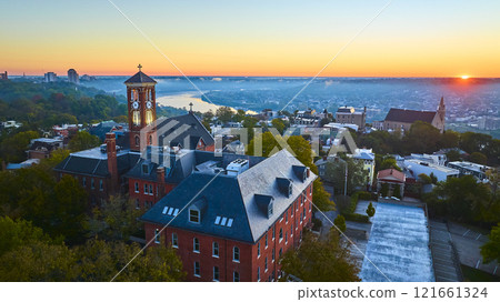Aerial of Historic Church Clock Tower and Town at Sunrise in Cincinnati Ohio Aerial of Historic Church Clock Tower and Town at Sunrise in Cincinnati Ohio 121661324