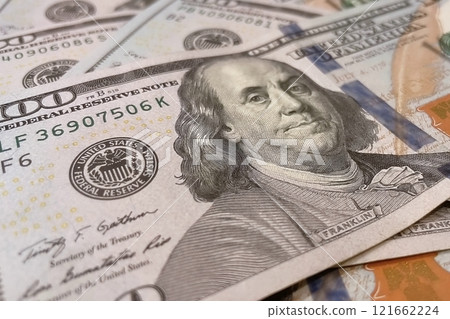US Dollar Banknotes.A close-up view of various US dollar banknotes. Finance and economy concept. US Dollar Banknotes.A close-up view of various US dollar banknotes. Finance and economy concept. 121662224