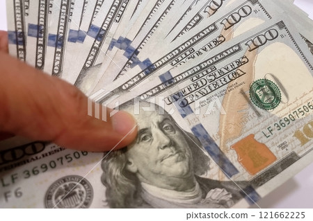 US Dollar Banknotes.A close-up view of various US dollar banknotes. Finance and economy concept. US Dollar Banknotes.A close-up view of various US dollar banknotes. Finance and economy concept. 121662225