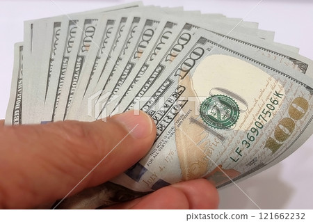 US Dollar Banknotes.A close-up view of various US dollar banknotes. Finance and economy concept. US Dollar Banknotes.A close-up view of various US dollar banknotes. Finance and economy concept. 121662232