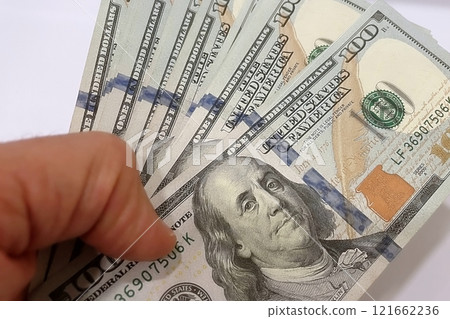 US Dollar Banknotes.A close-up view of various US dollar banknotes. Finance and economy concept. US Dollar Banknotes.A close-up view of various US dollar banknotes. Finance and economy concept. 121662236