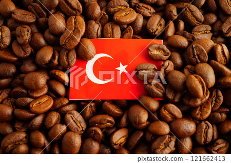 Turkey flag with shopping cart box on coffee beans, shopping online for imxport xmport. Turkey flag with shopping cart box on coffee beans, shopping online for imxport xmport. 121662413