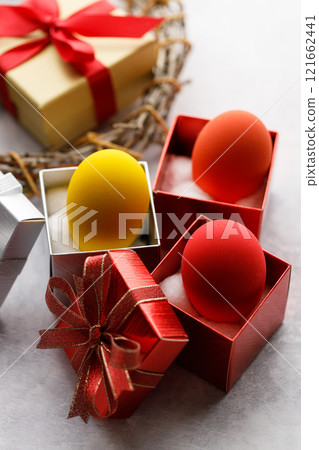 Colorful easter egg and gift boxes Colorful easter egg and gift boxes 121662441