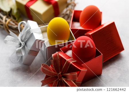 Colorful easter egg and gift boxes Colorful easter egg and gift boxes 121662442
